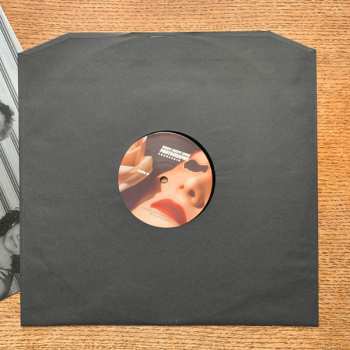 LP Snakeskin: They Kept Our Photographs