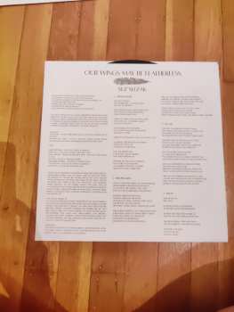 LP Suz Slezak: Our Wings May Be Featherless